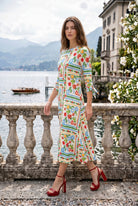Model wearing Nuggles® Gracie Dress in Garden Stripe