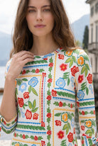 Model wearing Nuggles® Gracie Dress in Garden Stripe