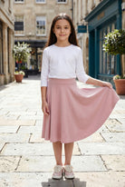Model wearing Nuggles®  Girl's Athleisure Skirt in Dusty Pink