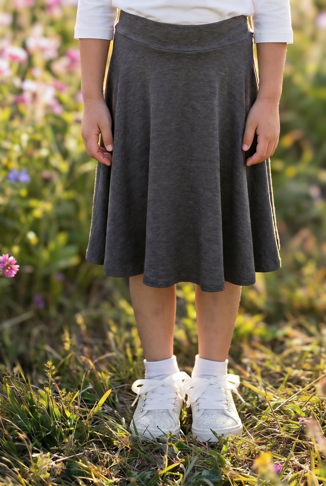 Model wearing Nuggles®  Girls' Athleisure Skirt
