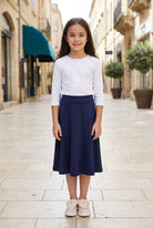 Model wearing Nuggles®  Girl's Athleisure Skirt in Navy