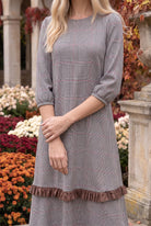 Nuggles® Patricia Dress in Glen Plaid, front view from neckline to hem showing the check scale