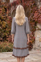 Nuggles® Patricia Dress in Glen Plaid, full-length back view showing the relaxed fit and ruffle tiers
