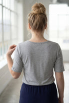 Model wearing Nuggles® Half Sleeve Essential Tee in Light Heather