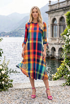 Model wearing Nuggles® Gracie Dress in Harvest Plaid