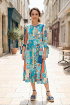 Model wearing Nuggles®  Hazel Dress in Blue Bird
