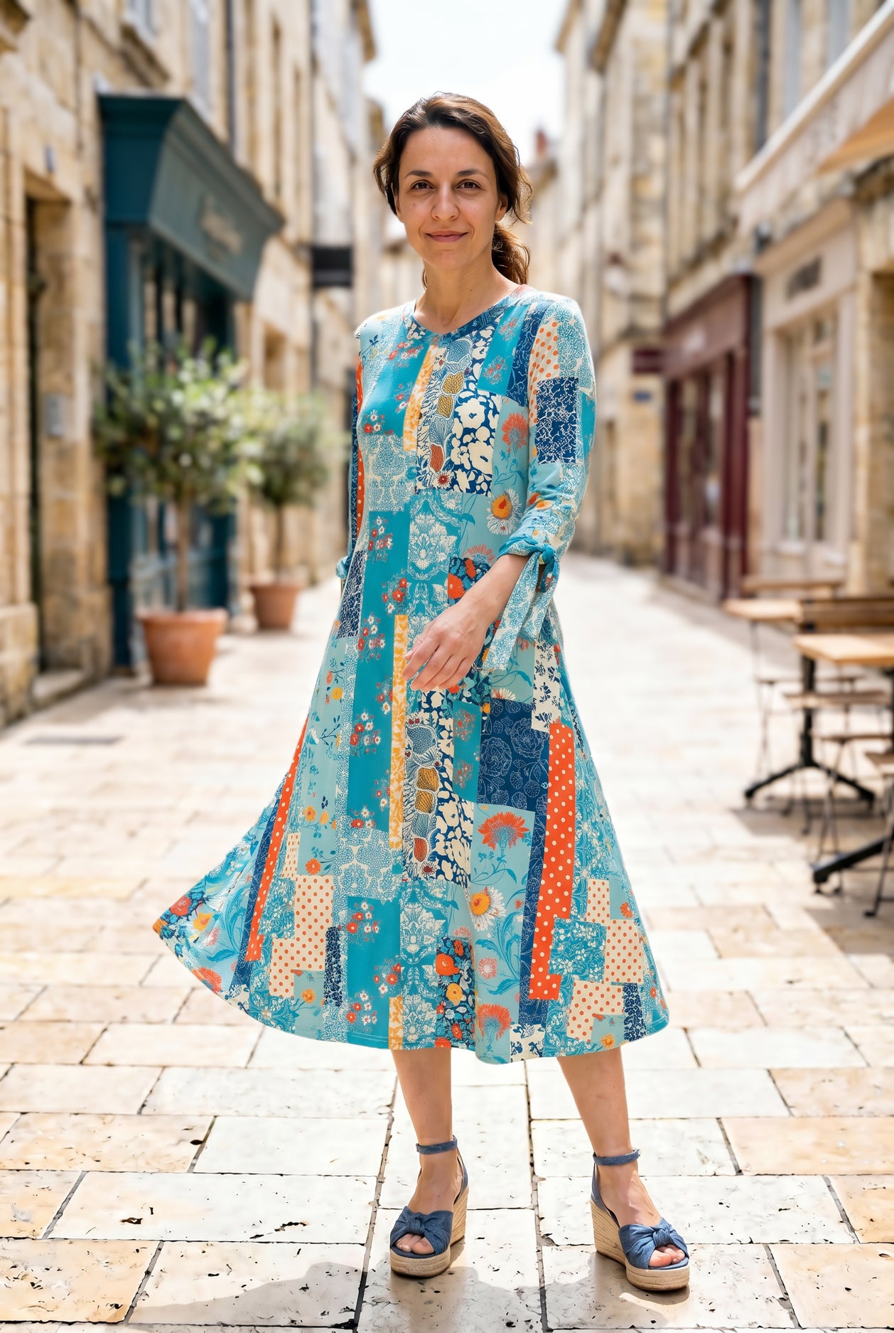 Model wearing Nuggles®  Hazel Dress in Blue Bird
