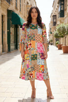 Model wearing Nuggles®  Hazel Dress in Carousel
