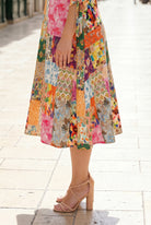 Model wearing Nuggles®  Hazel Dress in Carousel
