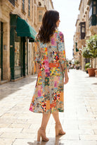 Model wearing Nuggles®  Hazel Dress in Carousel

