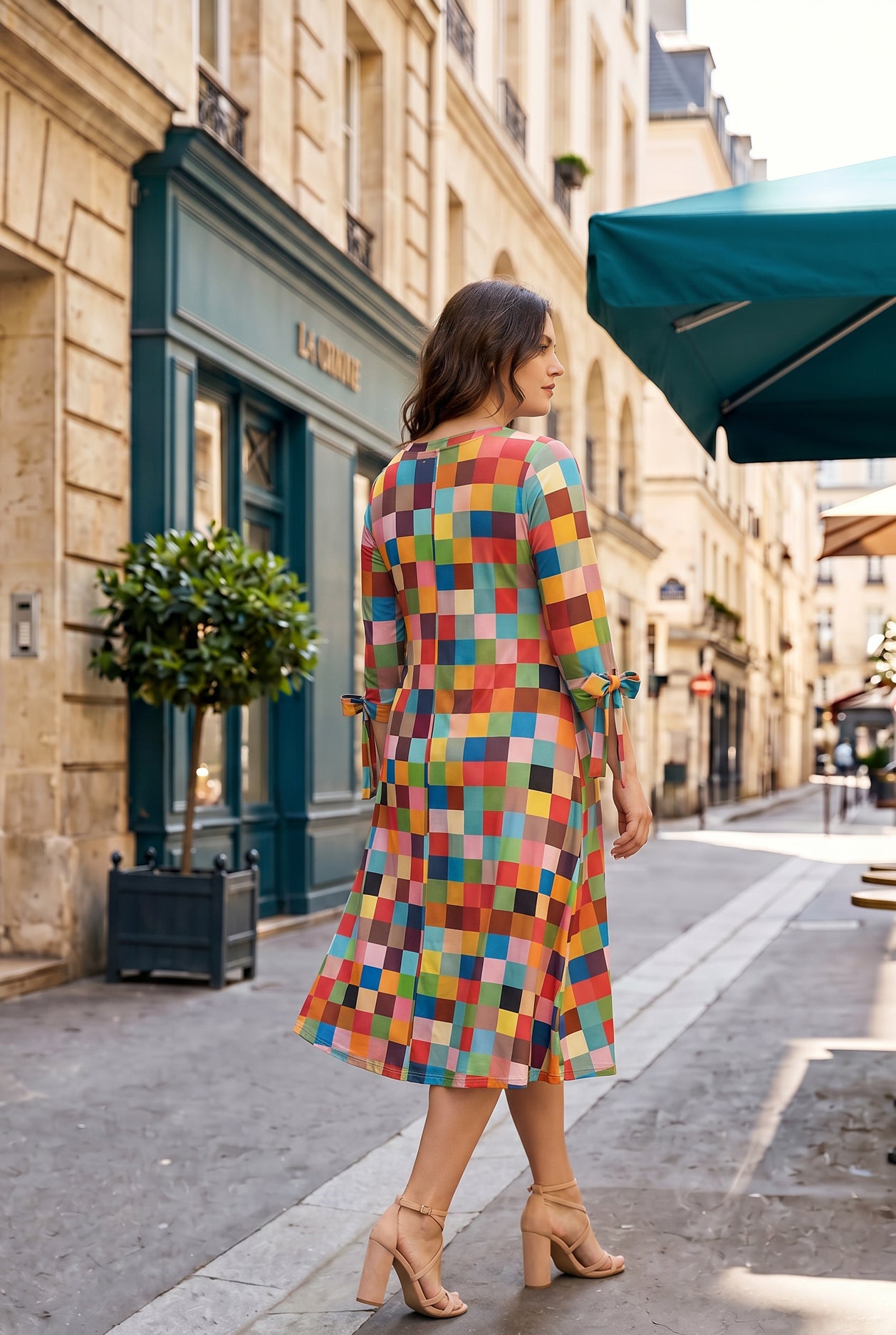 Model wearing Nuggles®  Hazel Dress in Retro Mosaic
