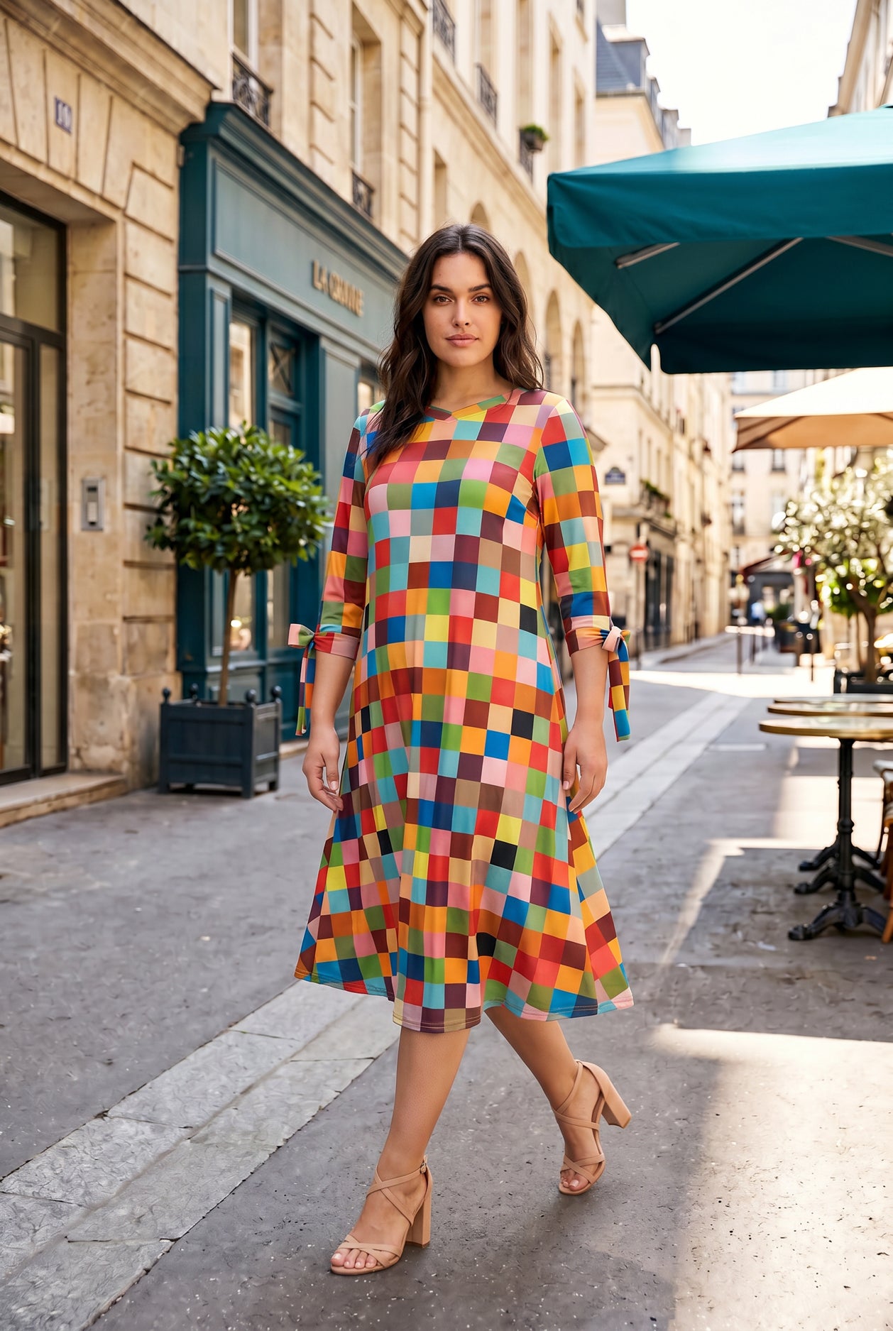 Model wearing Nuggles®  Hazel Dress in Retro Mosaic
