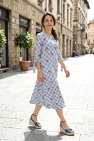 Model wearing Nuggles®  Hazel Dress in Sunday Bow
