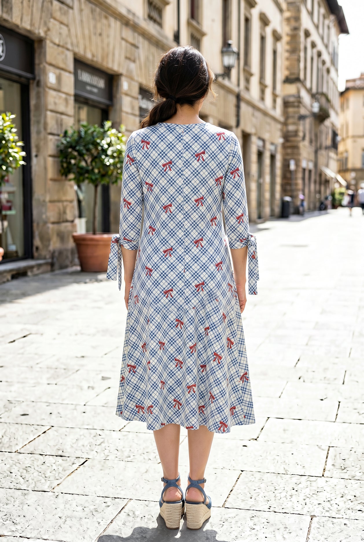 Model wearing Nuggles®  Hazel Dress in Sunday Bow
