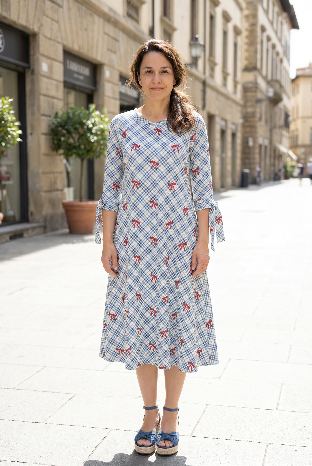 Model wearing Nuggles®  Hazel Dress in Sunday Bow
