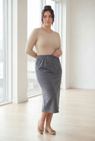 Model wearing Nuggles® 31" Classic Skirt in Heather Gray
