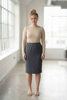 Model wearing Nuggles® 25" Classic Skirt in Heather Gray