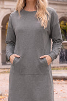 Nuggles® Oakley Hoodie Dress in Heather Gray, close-up with both hands tucked in the front pocket