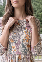 Nuggles® Cleo Maxi Dress in Hedgerow, close-up of the crew neckline with both hands resting at the collar
