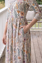 Nuggles® Cleo Maxi Dress in Hedgerow, waist-down crop with one hand tucked into the side seam pocket