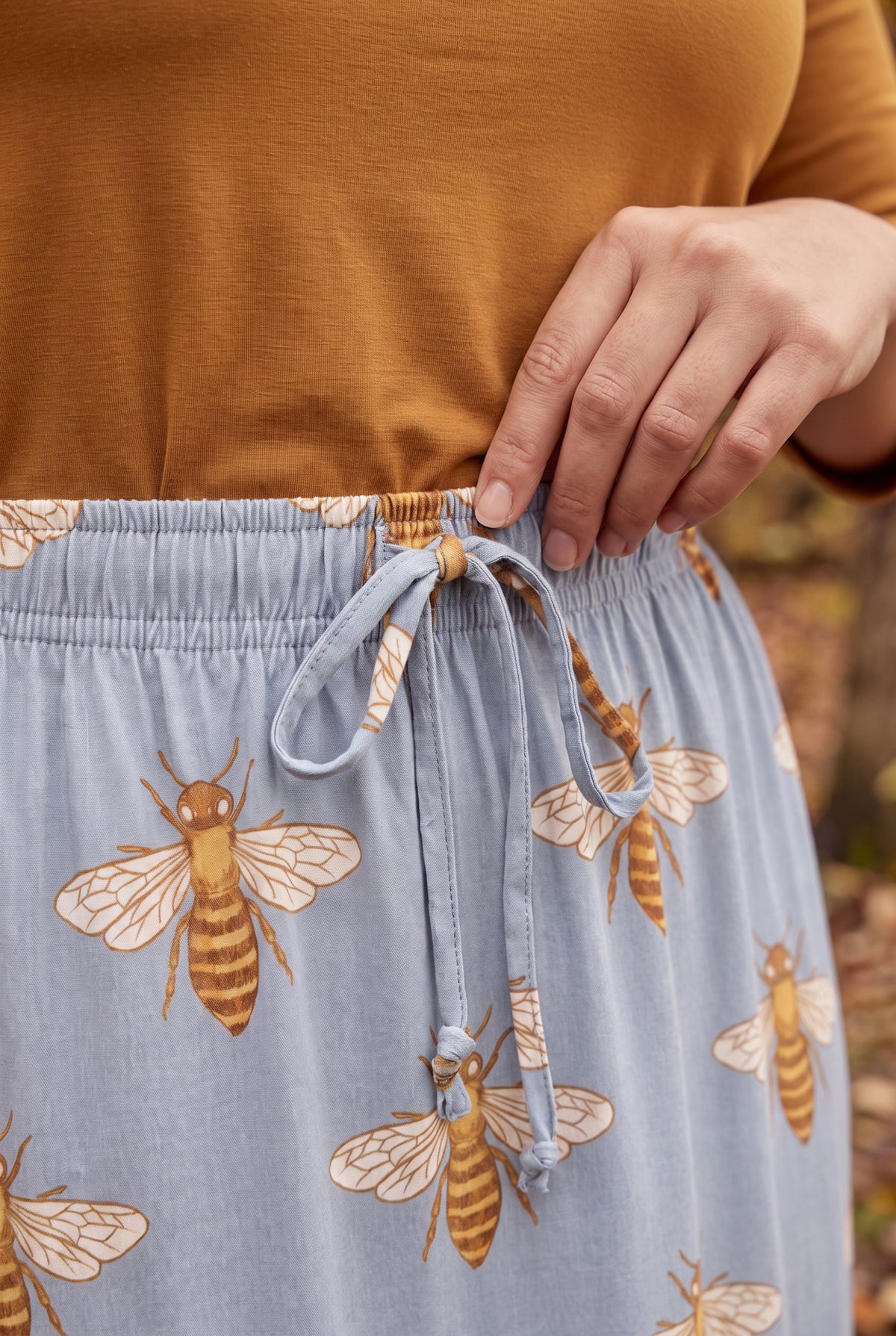 Model wearing Nuggles®  Sage Skirt in Honey Bee