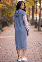 Model wearing Nuggles®  Hoodie Dress in Boho Mosaic