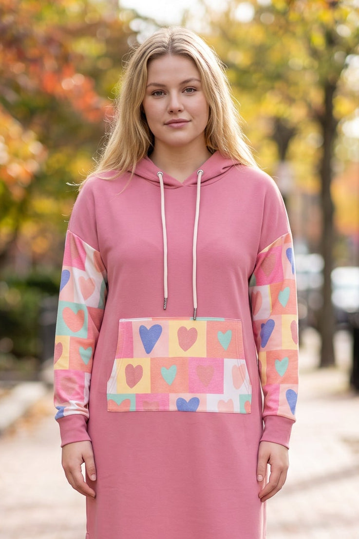 Model wearing Nuggles®  Hoodie Dress in Candy Hearts
