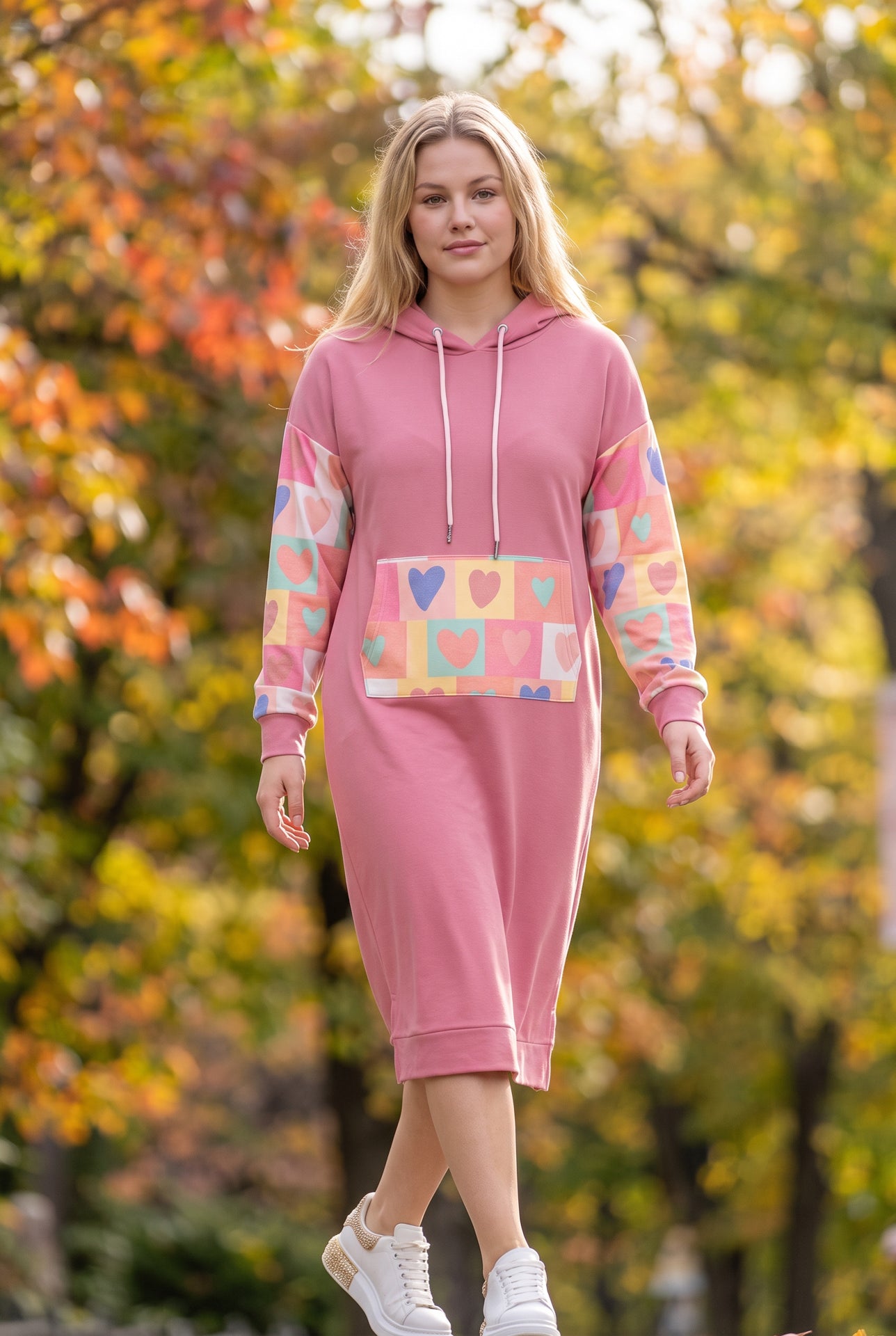 Model wearing Nuggles®  Hoodie Dress in Candy Hearts
