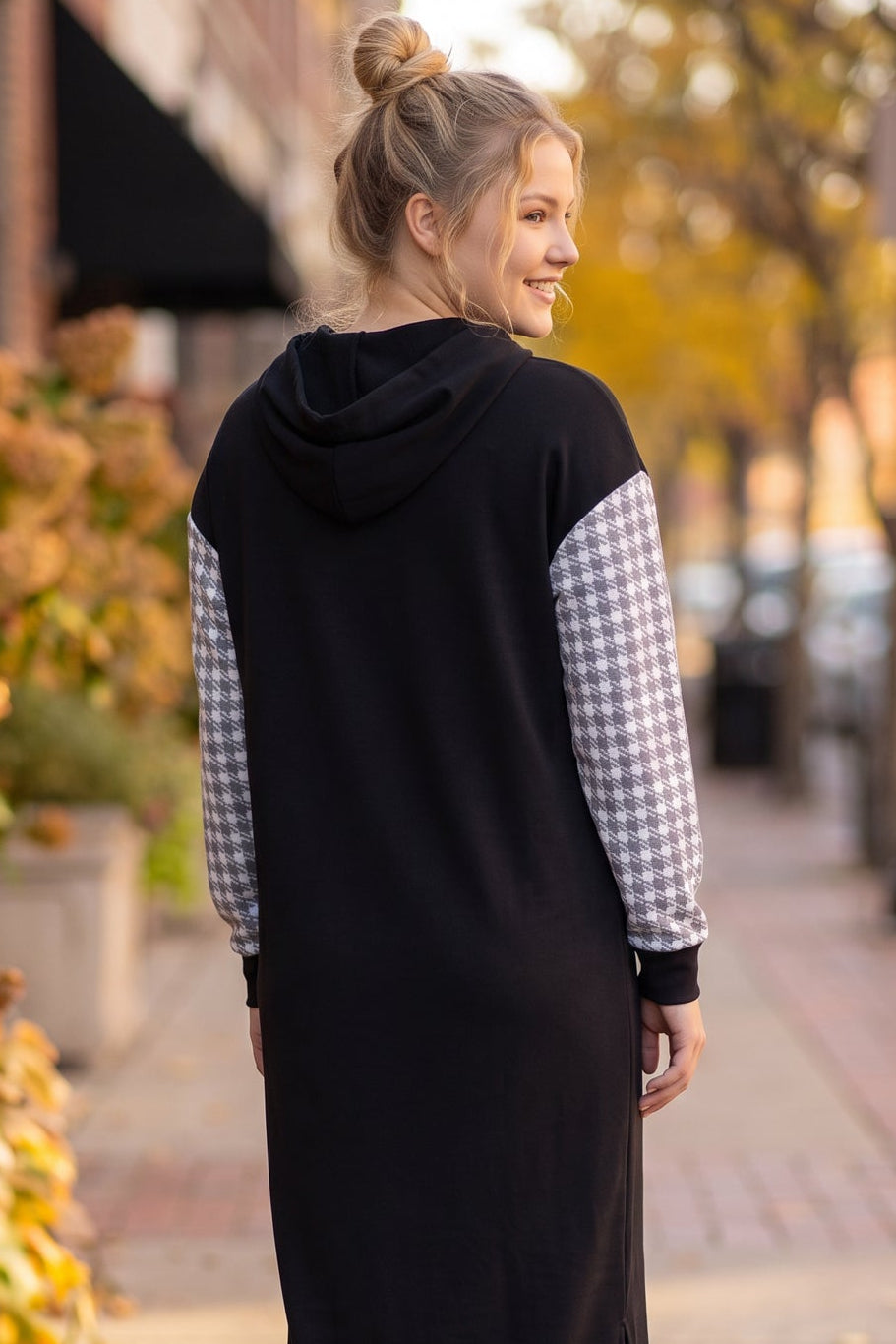 Model wearing Nuggles®  Hoodie Dress in Cookie Check