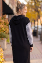 Model wearing Nuggles®  Hoodie Dress in Cookie Check