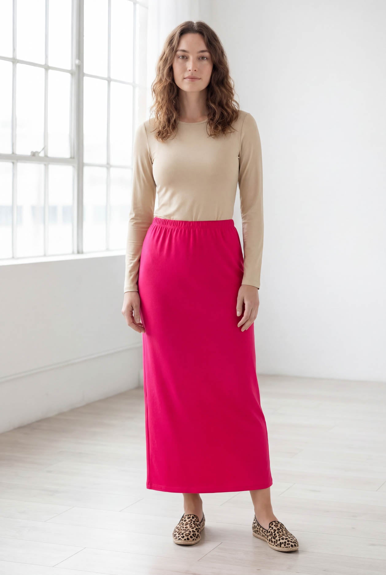 Model wearing Nuggles® 36" Classic Skirt in Hot Pink