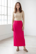 Model wearing Nuggles® 36" Classic Skirt in Hot Pink