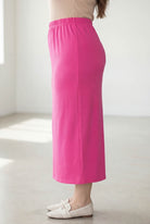 Model wearing Nuggles® 34" Classic Skirt in Hot Pink