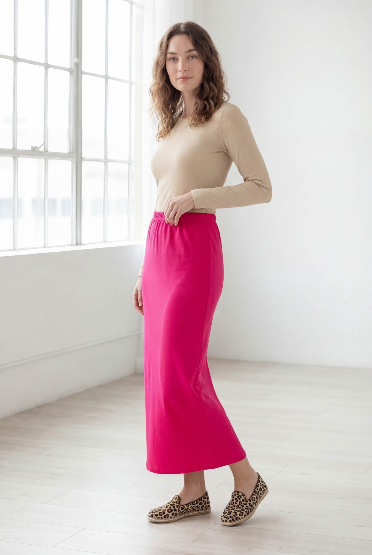 Model wearing Nuggles® 36" Classic Skirt in Hot Pink