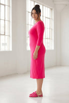 Model wearing Nuggles® Midi Layering Dress in Hot Pink