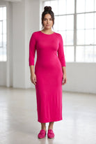 Model wearing Nuggles® Tea Layering Dress in Hot Pink