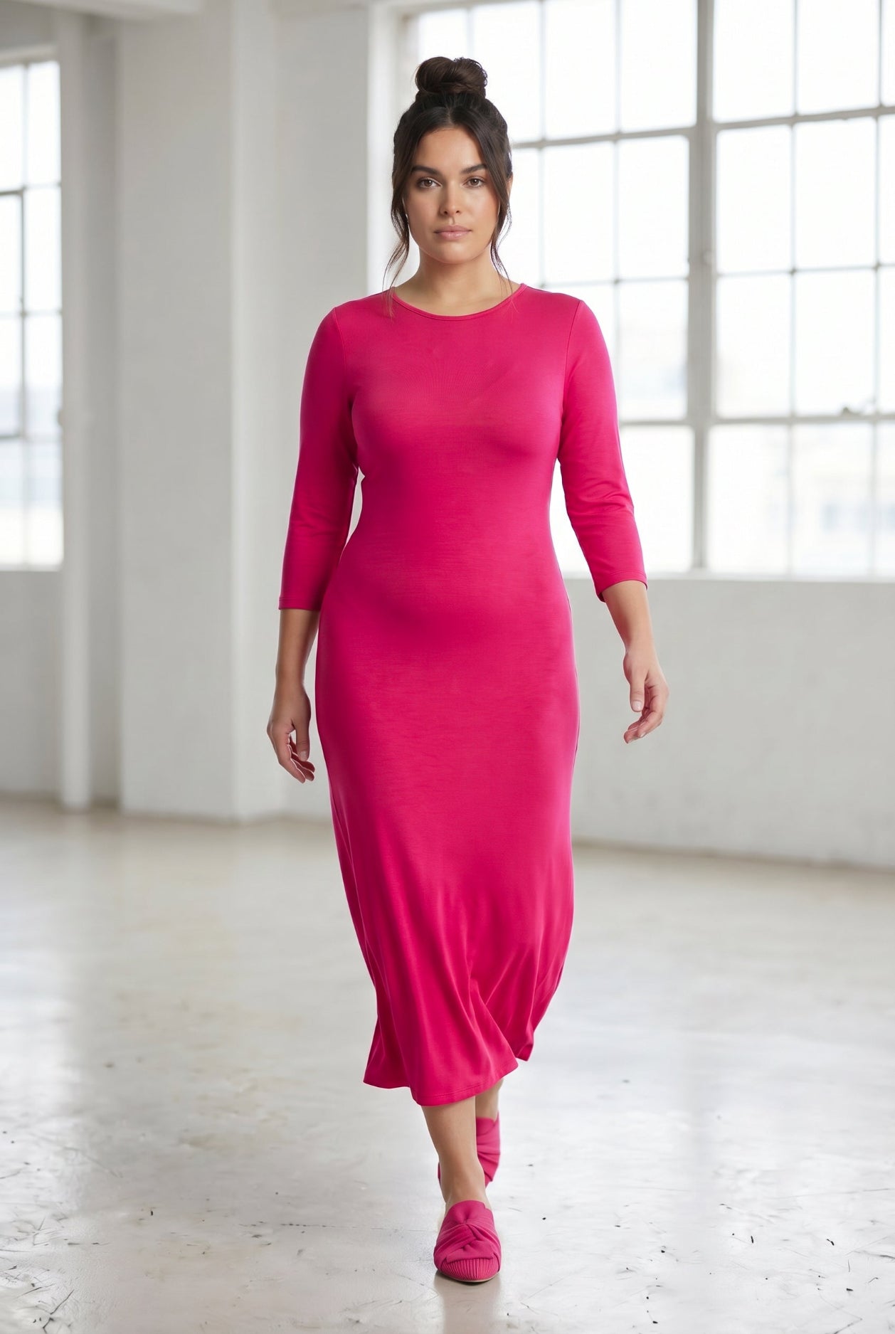 Model wearing Nuggles® Tea Layering Dress in Hot Pink