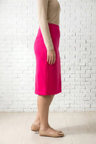 Model wearing Nuggles® 25" Relaxed Skirt in Hot Pink