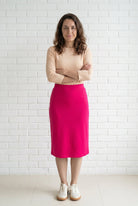 Model wearing Nuggles® 27" Relaxed Skirt in Hot Pink
