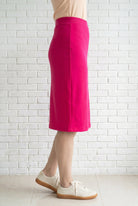 Model wearing Nuggles® 27" Relaxed Skirt in Hot Pink