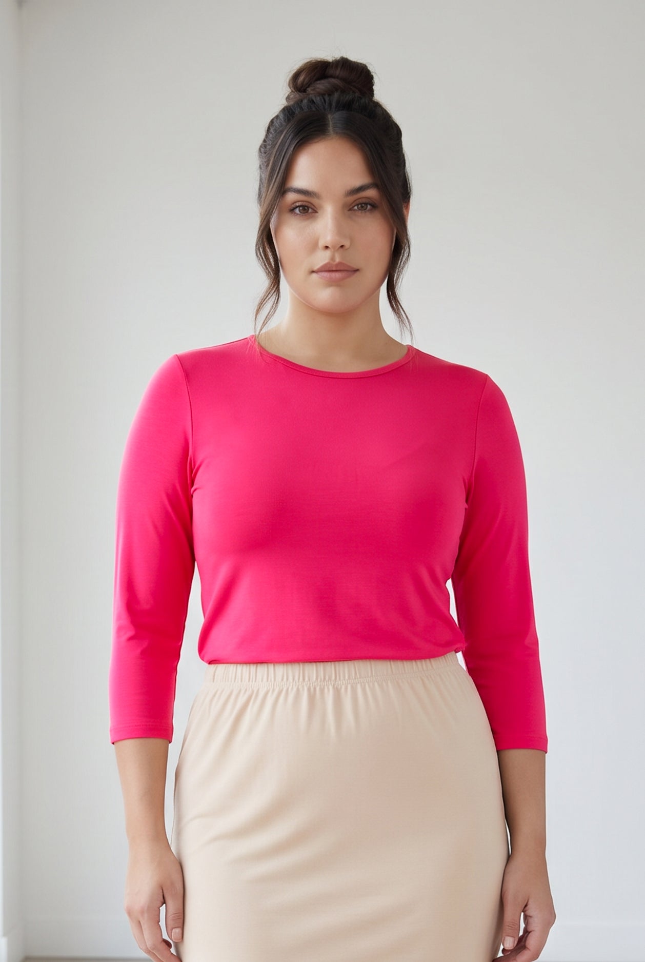 Model wearing Nuggles® 3/4 Essential Tee in Hot Pink