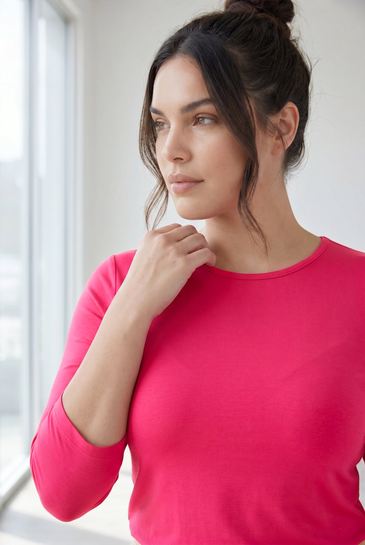 Model wearing Nuggles® 3/4 Essential Tee in Hot Pink