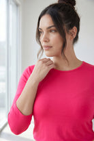 Model wearing Nuggles® 3/4 Essential Tee in Hot Pink