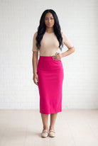 Model wearing Nuggles® 31" Relaxed Skirt in Hot Pink