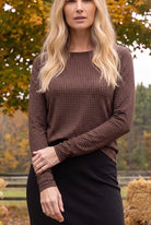 Model wearing Nuggles®  Long Sleeve Essential Tee in Houndstooth