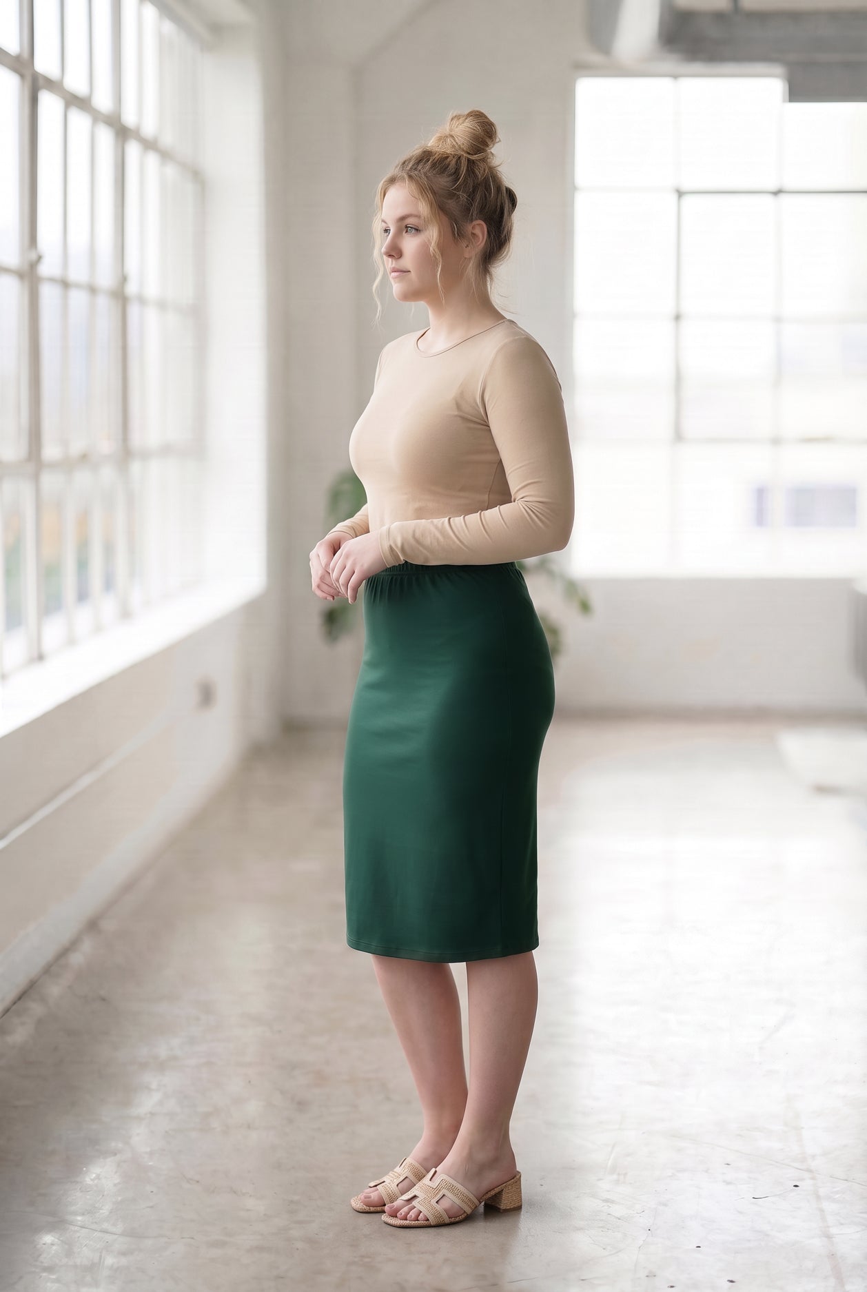 Model wearing Nuggles® 27" Classic Skirt in Hunter Green