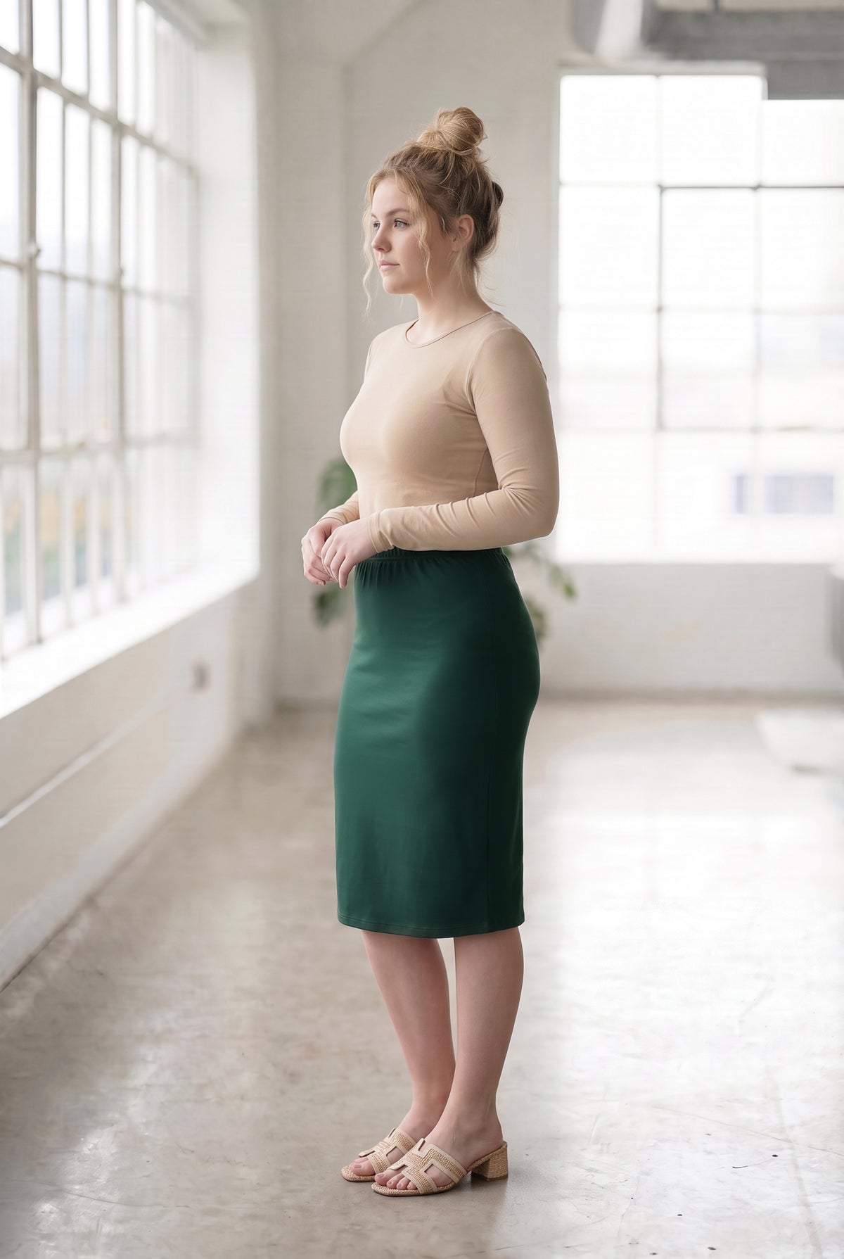 Model wearing Nuggles® 27" Classic Skirt in Hunter Green