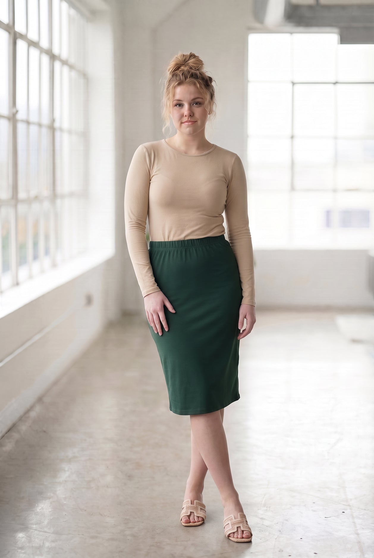 Model wearing Nuggles® 27" Classic Skirt in Hunter Green