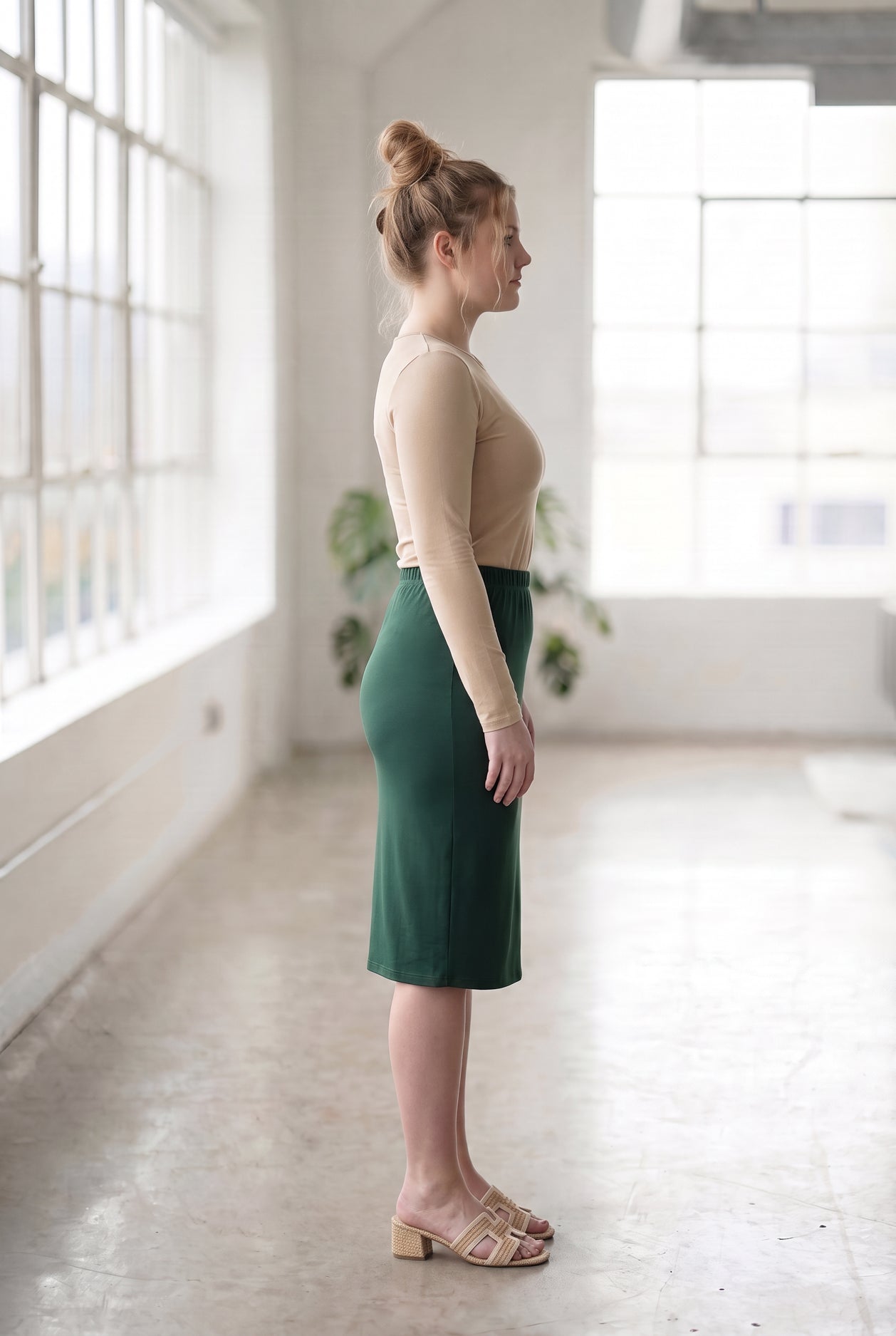 Model wearing Nuggles® 27" Classic Skirt in Hunter Green