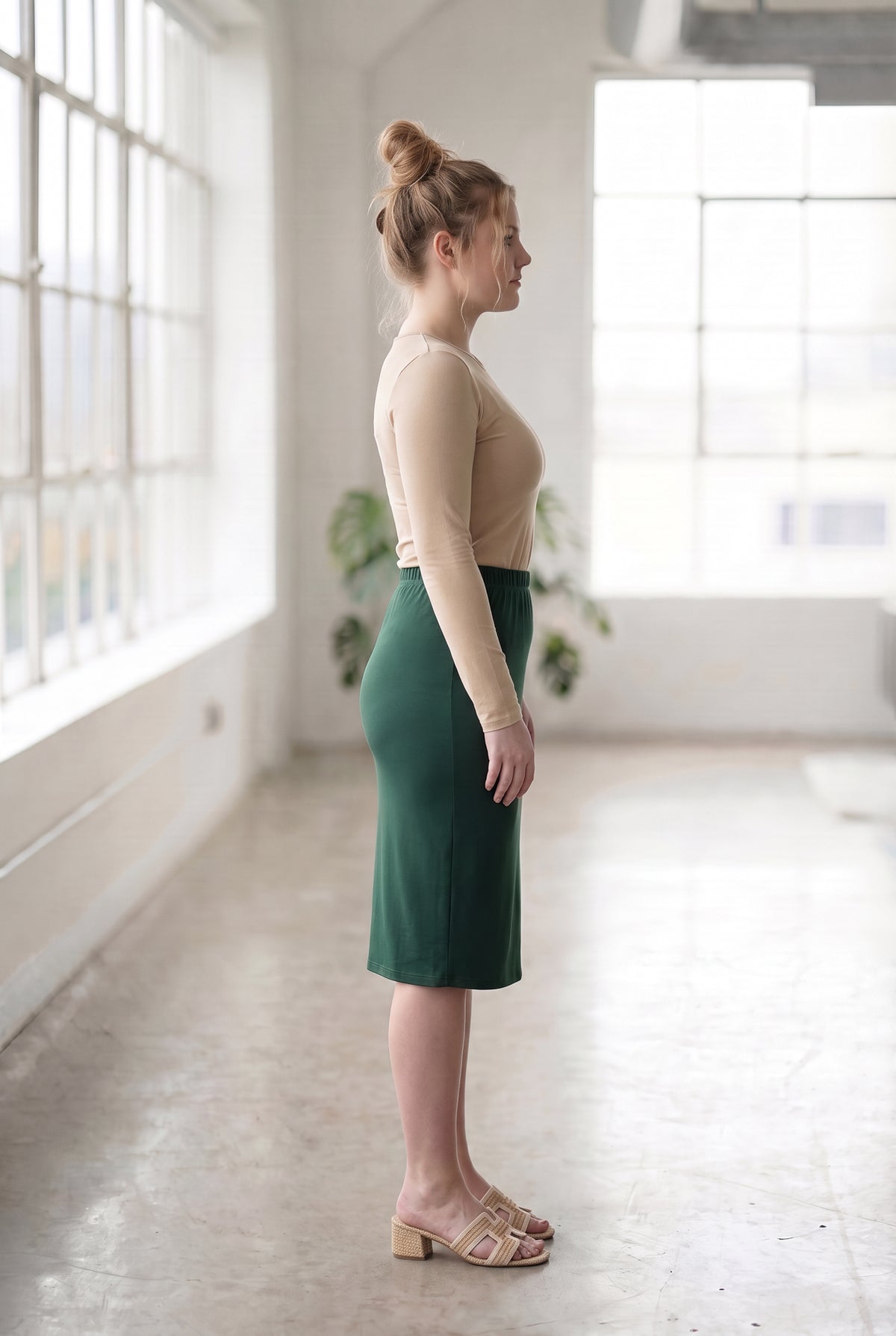 Model wearing Nuggles® 27" Classic Skirt in Hunter Green